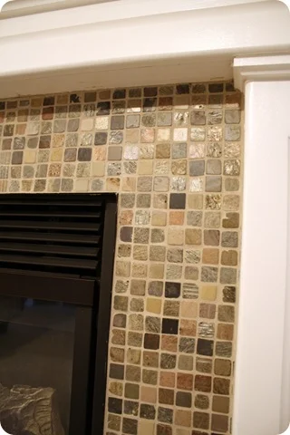 green gray rust mosaic tile fireplace